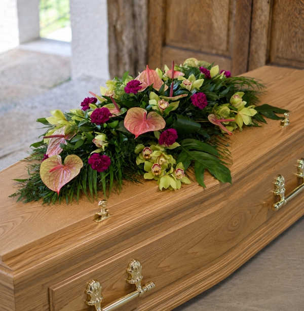 Orchid and anthurium casket spray