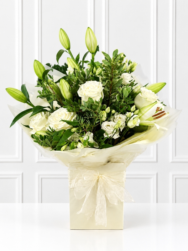 Rose, Lily and Lisianthus hand tied